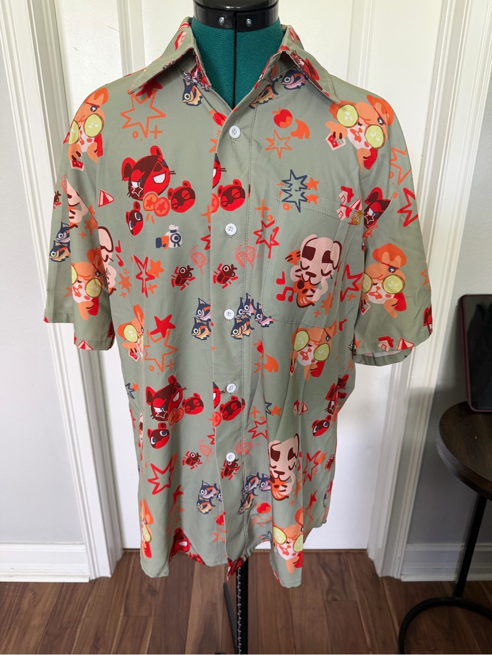 Green Short-Sleeve Button-Down Shirt with Multicolor Cartoon Print